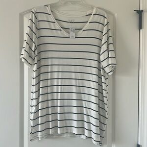 Maurice’s white shirt with black stripes